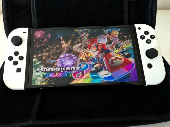 Console Nintendo Switch OLED + MárioKart 8 + SD 128 GbKart 8 deluxe.