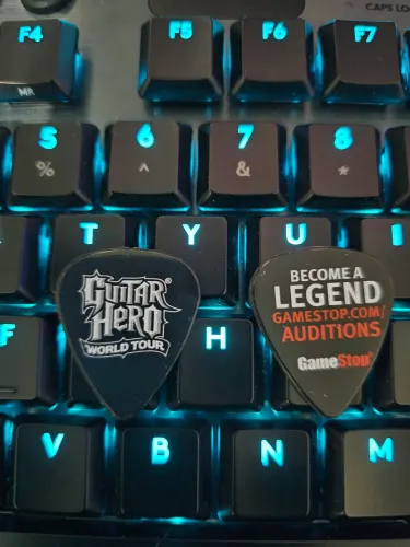 Palhetas Guitar Hero World Tour Promocional Gamestop (unidade)