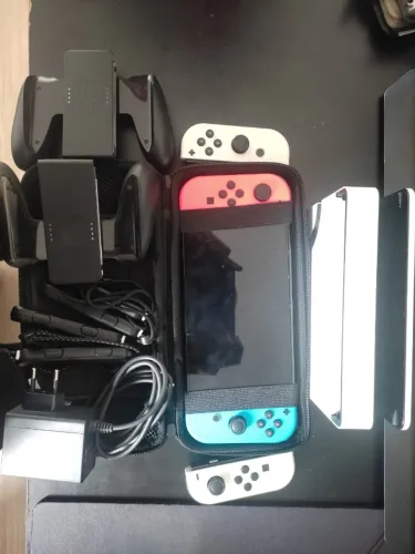 Nintento Switch OLED + Controles + Estojo de Armazenamento