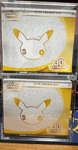 Etb pokemon ingles 30 anos com acrilico