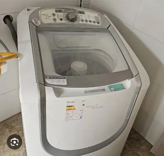 Máquina de lavar com defeito 