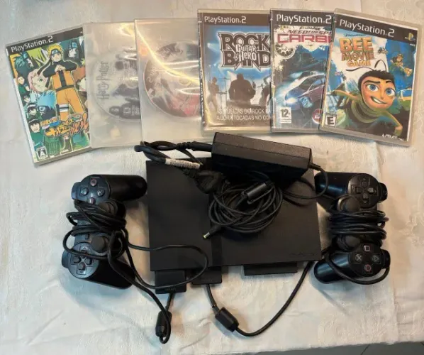 Playstation 2 Usado com 2 controles + 1 Memory Card 8MB + pequena colecao de jogos