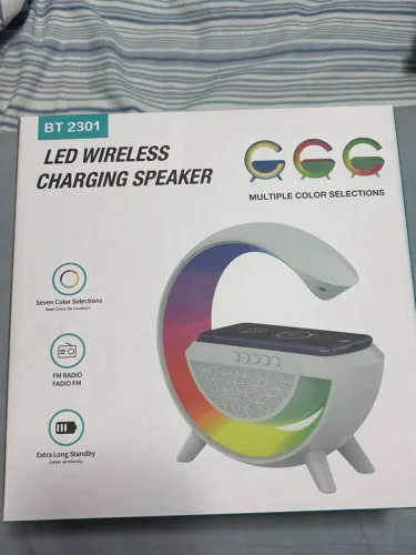 Luminária e carregador por indução