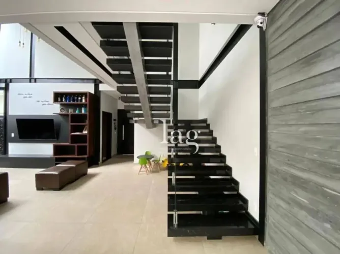 Casa com 3 dormitórios à venda, 275 m² por R$ 2.200.000,00 - Condomínio Villa dos Inglezes