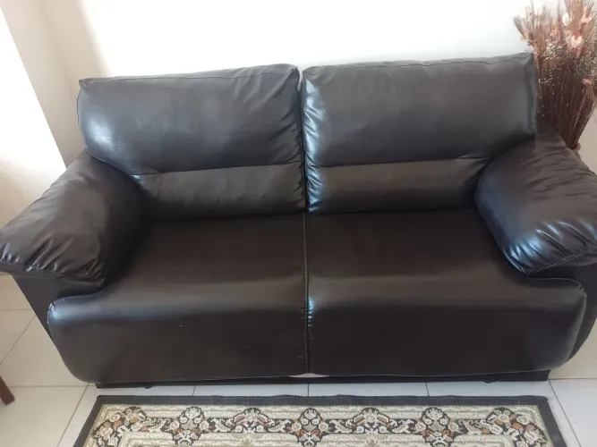 Sofá cama couro