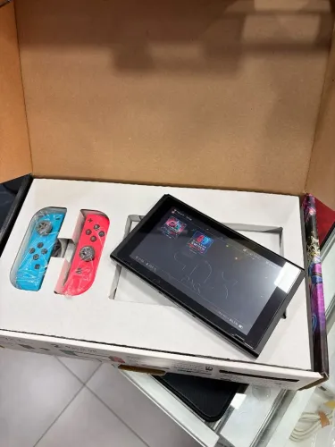 Nintendo Switch v2 desbl@quei@ na caixa novinho FAÇO OLX