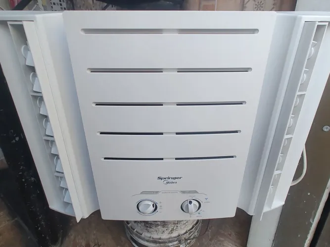 Ar condicionado Springer 10 BTUs 127 volts semi.novo lavado ontem 490,00