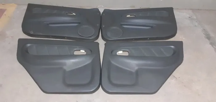 Jogo de Forro de Porta Couro Kia Shuma Sephia 99/00 Original