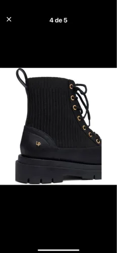 Bota Preta tratorada lana perfume 