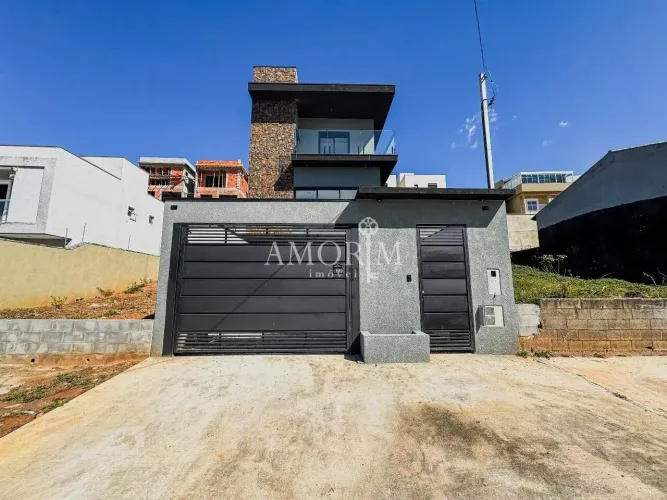 CASA Á VENDA COM 3 SUÍTES PISCINA E 4 VAGAS EM CAJAMAR