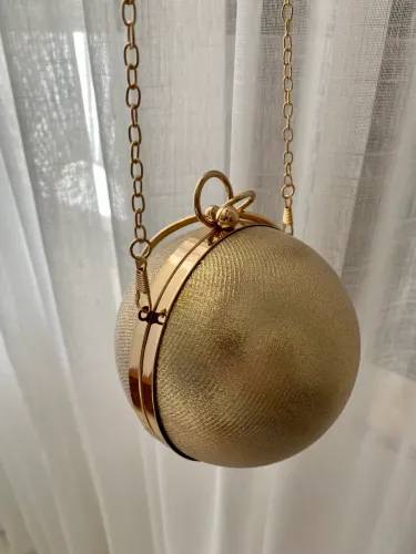 Bolsa festa bola dourada