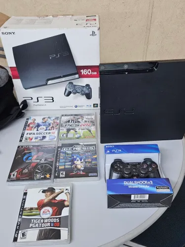Vendo Play 3 160GB com controle e Jogos.