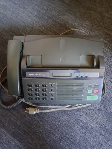 Telefone e fax Sharp