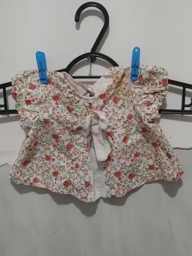 Roupas é sapato de bebê 