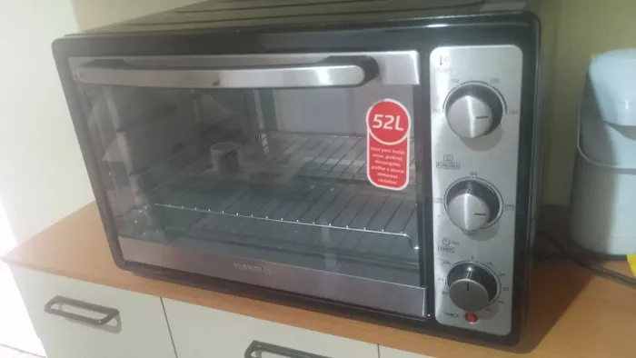Vendo esse forno semi novo msm top
