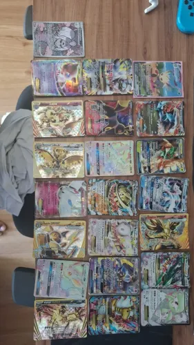 Carta Leafeon vmax alt art (MP)+25 cartas raras. Aberto a trocas e ofertas