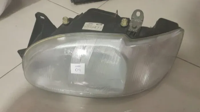 FAROL DIANTEIRO ESCORT ZETEC ORIGINAL VALEO CIBIE ESQUERDO (97 A 02).