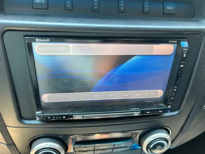 Som multimidia original Pajero Full marca Clarion