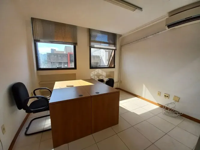 Crédito Real Vende! Sala em prédio de centro comercial
