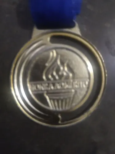 Medalha dourada horra ao MÉRITO