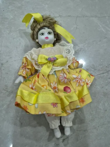 Boneca porcelana