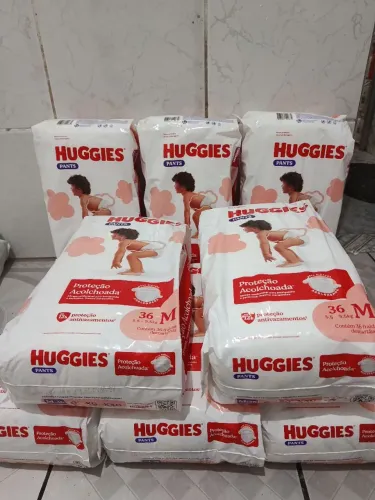 Fralda Huggies M $45,00 cada