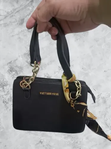 bolsa de mão victoria voice
