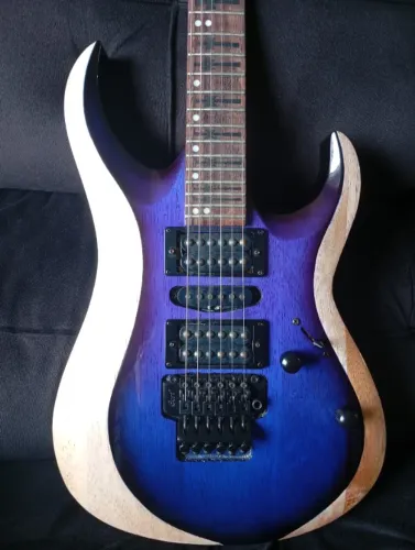 Guitarra Cort X6 custom Translucid Blue and natural wood parcelo no cartão de crédito.