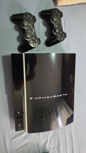 Ps3 Fat com 500Gb e caixa.