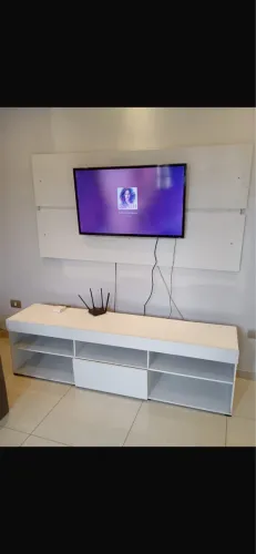 Rack painel e sofá