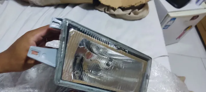 Farol fiat uno 2002