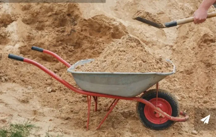 Areia de obra doação