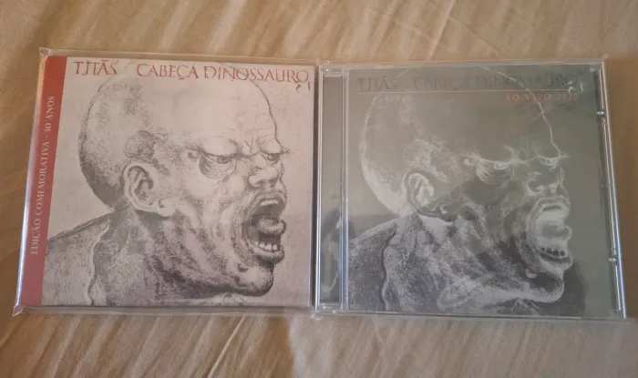 CDs Cabeça Dinossauro