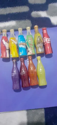 10 garrafinhas coca cola