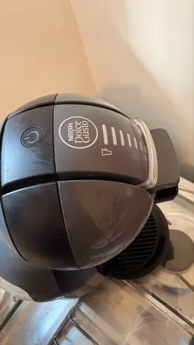 cafeteira dolce gusto funcionando perfeitamente