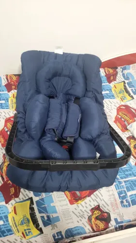 Vendo bebê conforto + capa protetor por 50,00