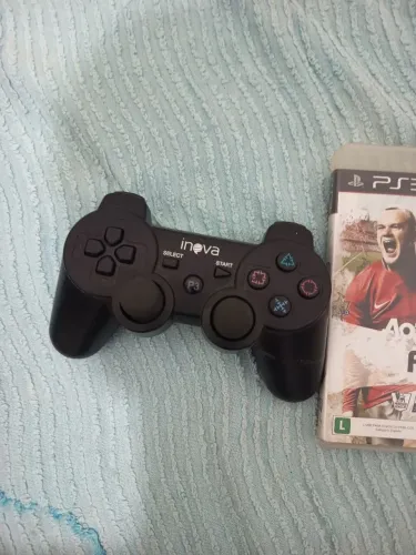 Manete ps3 + o cabo de carregador novo.