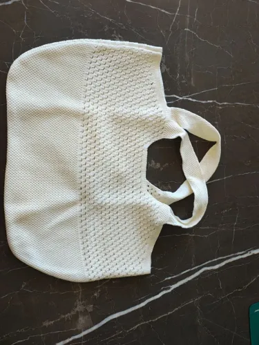 Bolsa de fio no estilo tricot na cor off white Monnari/ Bambini e Sollo Fine