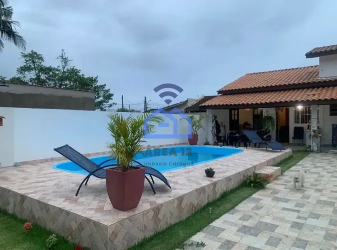 Casa com piscina à Venda em Massaguaçu, Caraguatatuba, SP