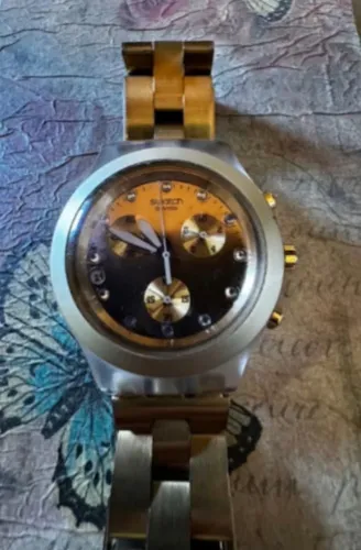 Relógio Swatch Dourado