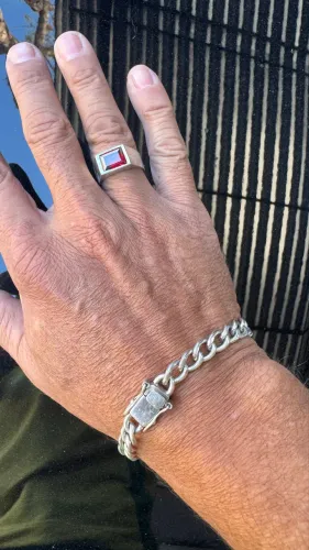 Pulseira de prata e anel maciço