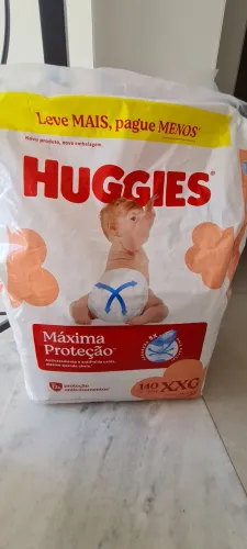 70 Fraldas Huggies XXG