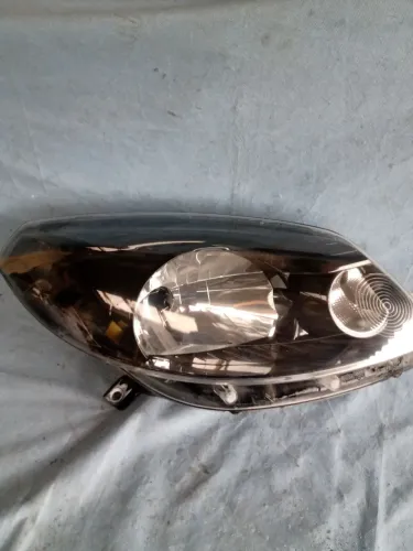 Farol Sandero Máscara Negra Original 2012 a 2014 lado Direito 