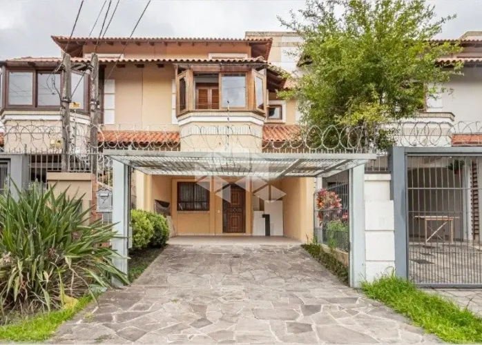 CASA 3 QUARTOS, 1 SUÍTE E 2 VAGAS DE GARAGEM NO BAIRRO IPANEMA