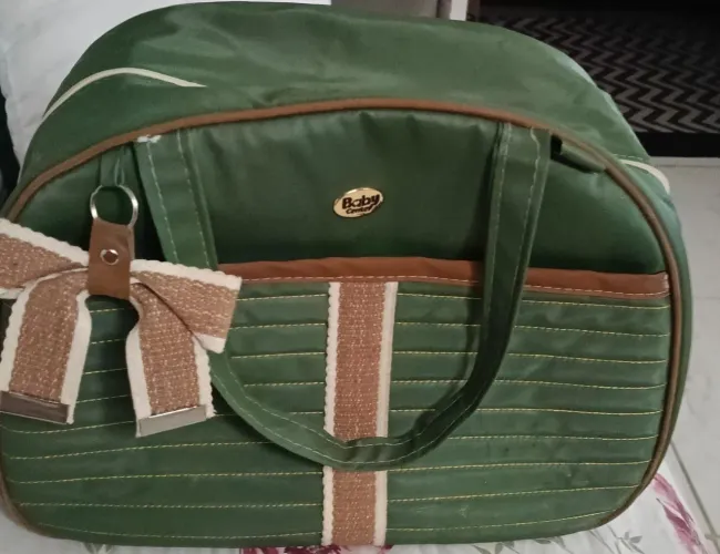 Bolsa maternidade masculina infantil conservada