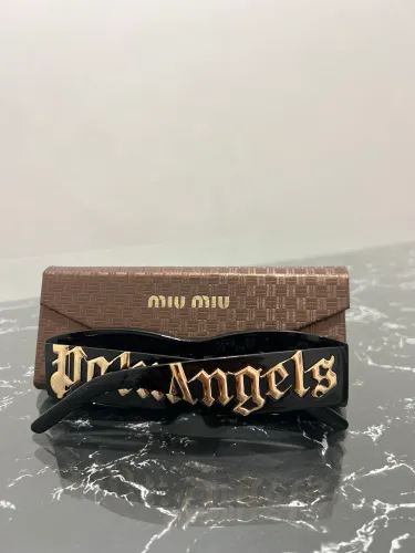 Óculos Miu Miu Palm Angels