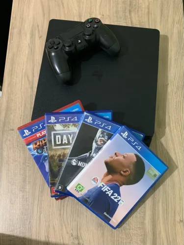 PS4 slim + 4 jogos e 1 controle