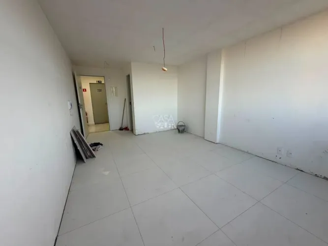 Sala com vaga na garagem