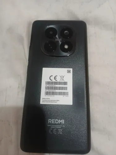 Vendo celular redimi note 15 semi novo