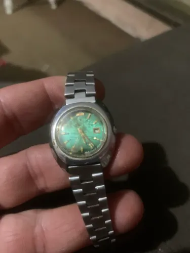 Orient Vintage automático com mostrador verde esmeralda c defeito